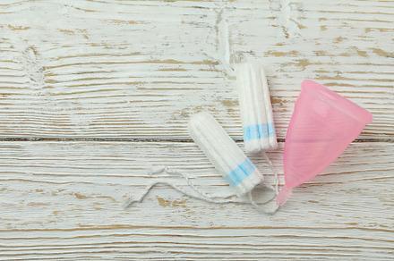 Concept of menstruation on wooden background, space for text, a Health & Medical Photo by AtlasStudio PRO