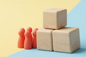 Team Figures Stacked Wooden Blocks, a Business Photo by thepslr