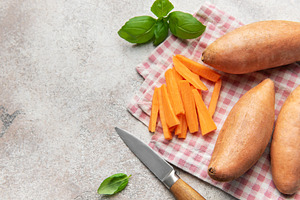Sweet potato fries prep with basil and knife, a Food & Drink Photo by Olena Rudo
