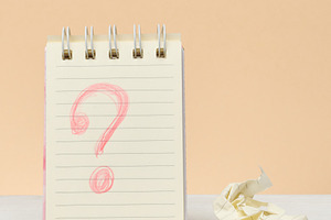 An open notebook with a question mark drawn in red pencil next t, a Business Photo by ndanko