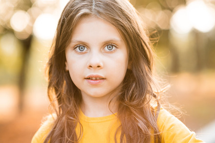 Kid girl walk in autumn park, a Person Photo by morrowlight