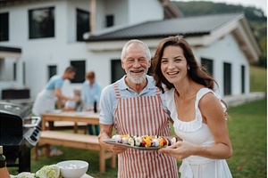 Older father and adult daughter, a Person Photo by HalfPoint
