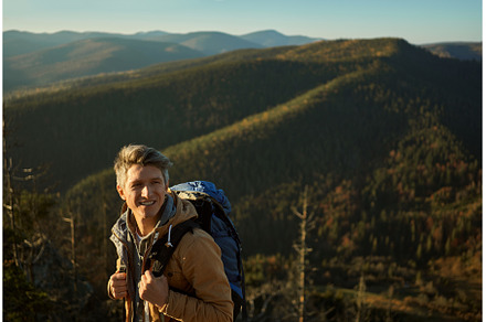 Adventure man enjoying nature and, a Nature Photo by vitaliymateha photography
