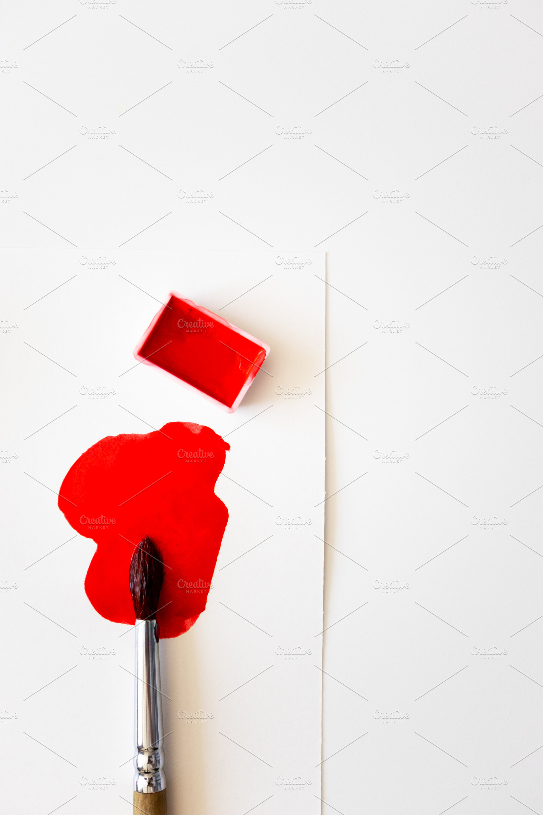 Close-up red watercolor spot, an Arts & Entertainment Photo by Olha Kozachenko
