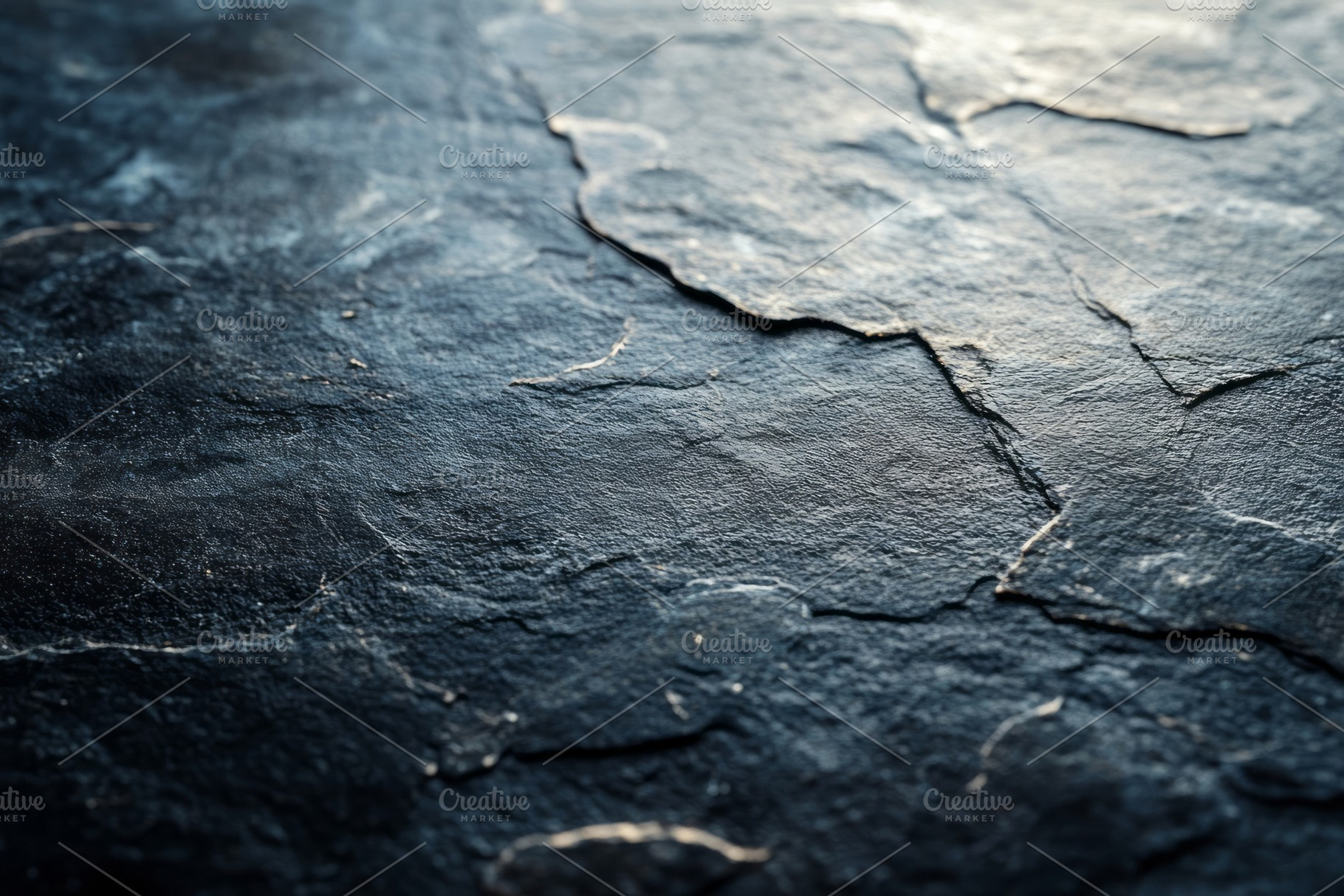Close-up of a textured, dark stone surface with natural cracks and highlights,, a Background Photo by ImageMir