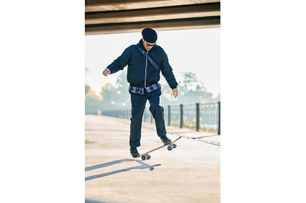 Skateboarder does ollie trick on, a Person Photo by Gladkov photography