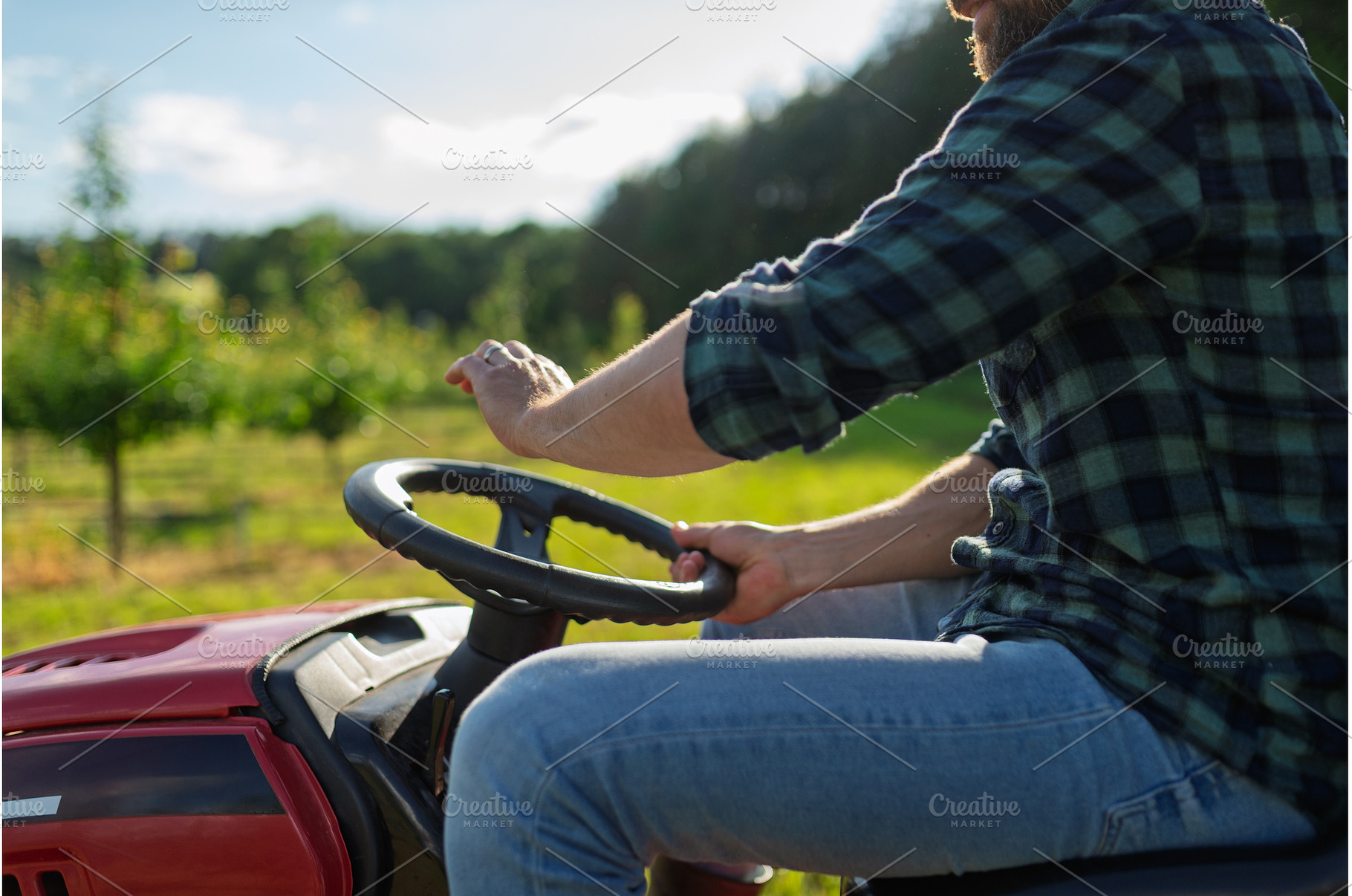 Close up of farmer driving small, a Business Photo by HalfPoint
