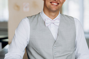 portrait of a groom in a suit and white bow, a Person Photo by Weddings, People, Travel