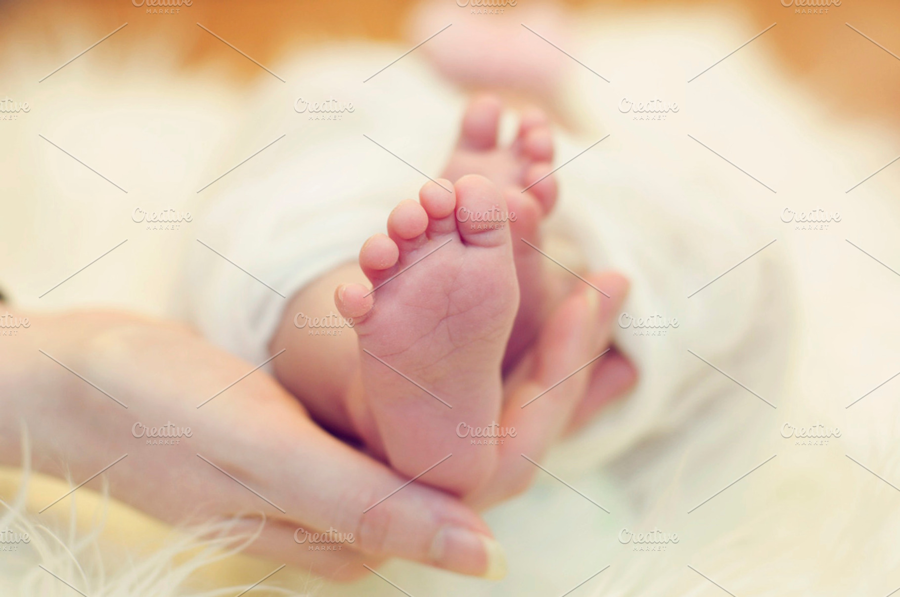 Newborn Feet/Mother's Hand