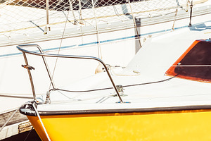 Sailboats moored in sunny marina wit, a Photo by Dvoevnore photos