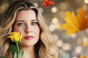 Beautiful young woman holding a yellow rose, posing with autumn, a Person Photo by Studio ANNA