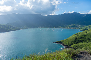 Taiohae Bay and town with anchored sailboats in Nuku Hiva, Marqu, a Nature Photo by GoodGoods