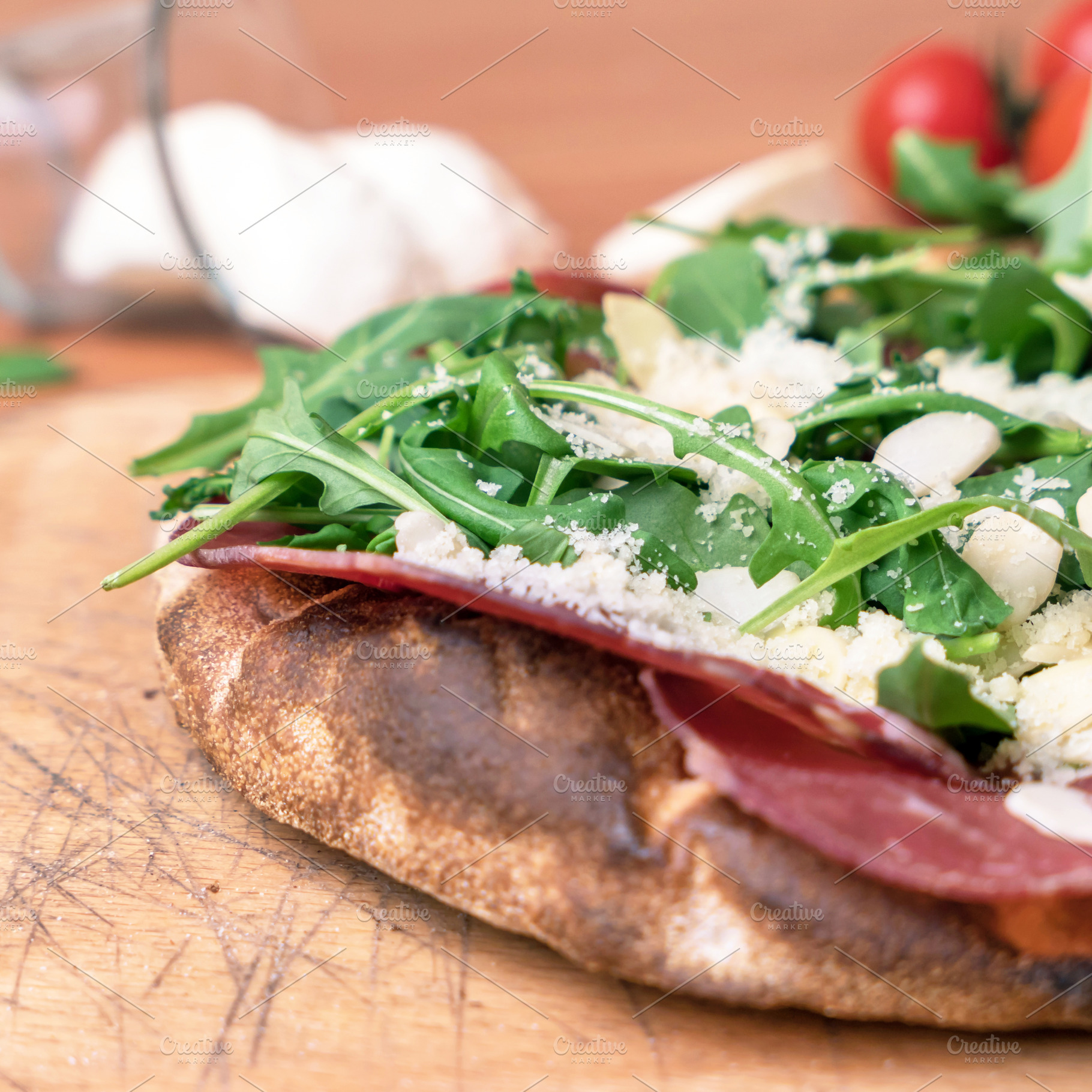 Pizza with raw ham, a Food & Drink Photo by KYNA STUDIO