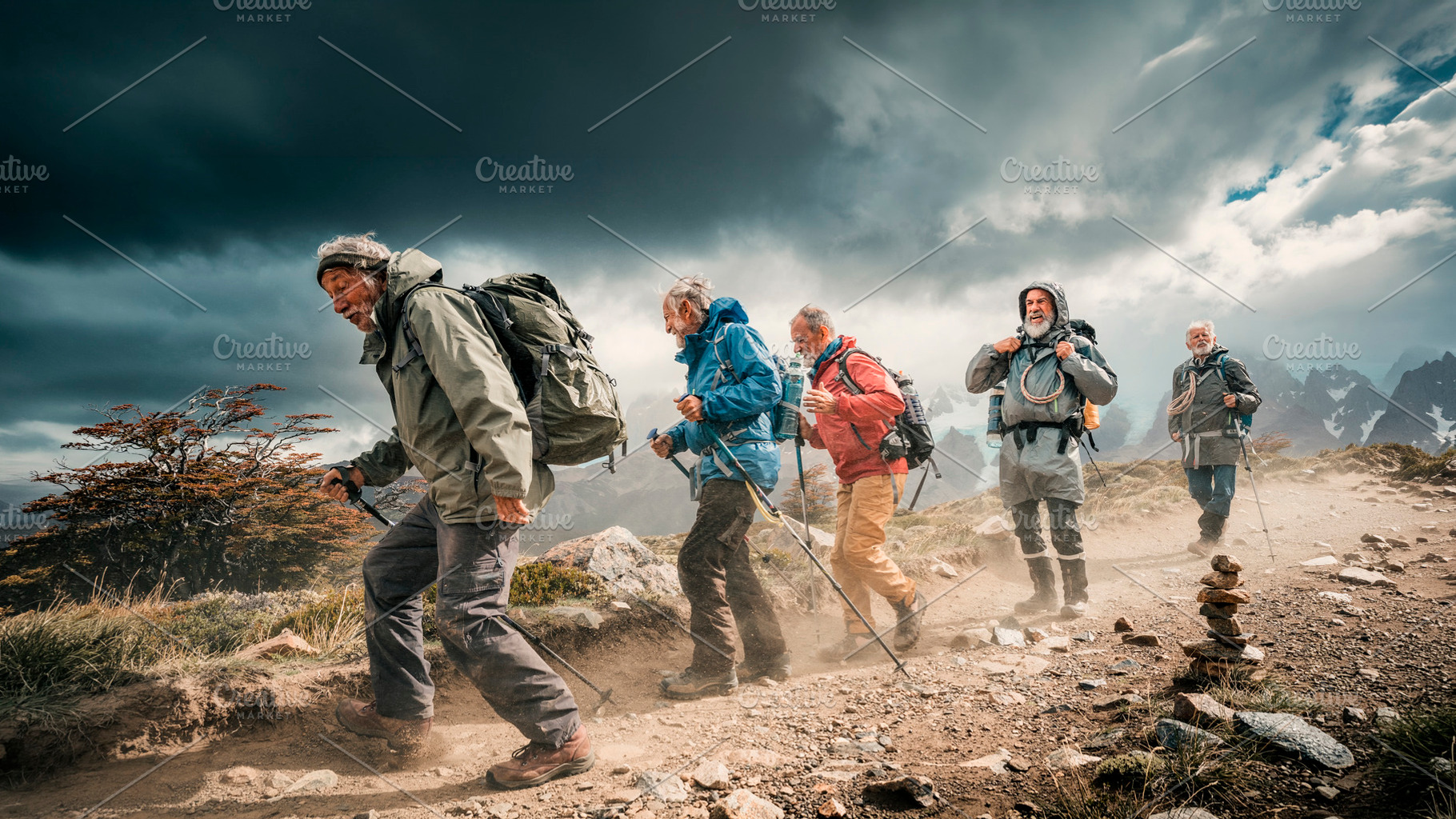 Group of ordinary senior hikers trek, a Person Photo by DanFLCreativo