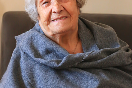 Portrait of a very elderly woman close-up. Positive ninety year old grandmother, a Person Photo by sabyna75
