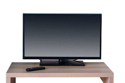 Smart TV on the cabinet in modern living room, a Technology Photo by Casanowe-studio
