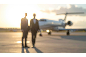 Two businessmen in formal suits, a Transportation Photo by Igor Tichonow