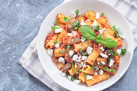 Rigatoni alla Norma pasta with eggplant, tomato, basil, ricotta salata, horizon