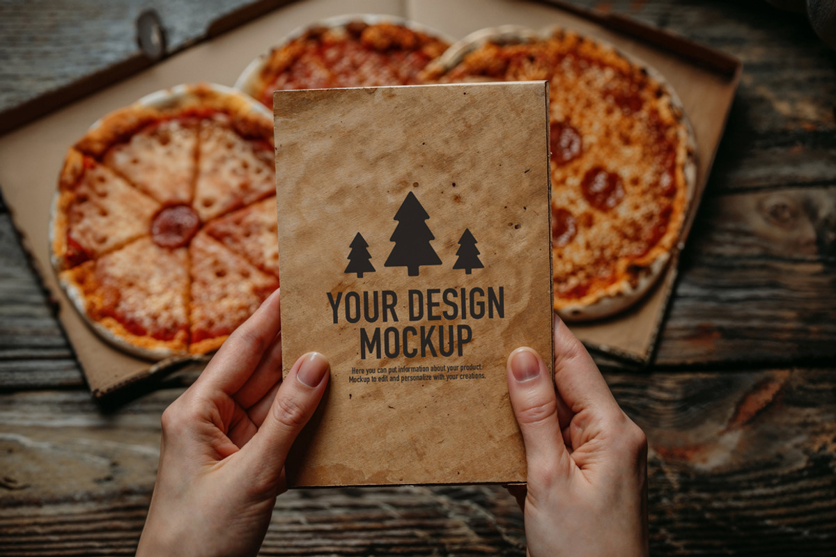 Pizza menu mockup with hands, a Product Mockup by OSORIOartist