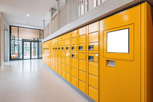 Bright yellow lockers in a modern hallway, a Photo by AlyaAnd