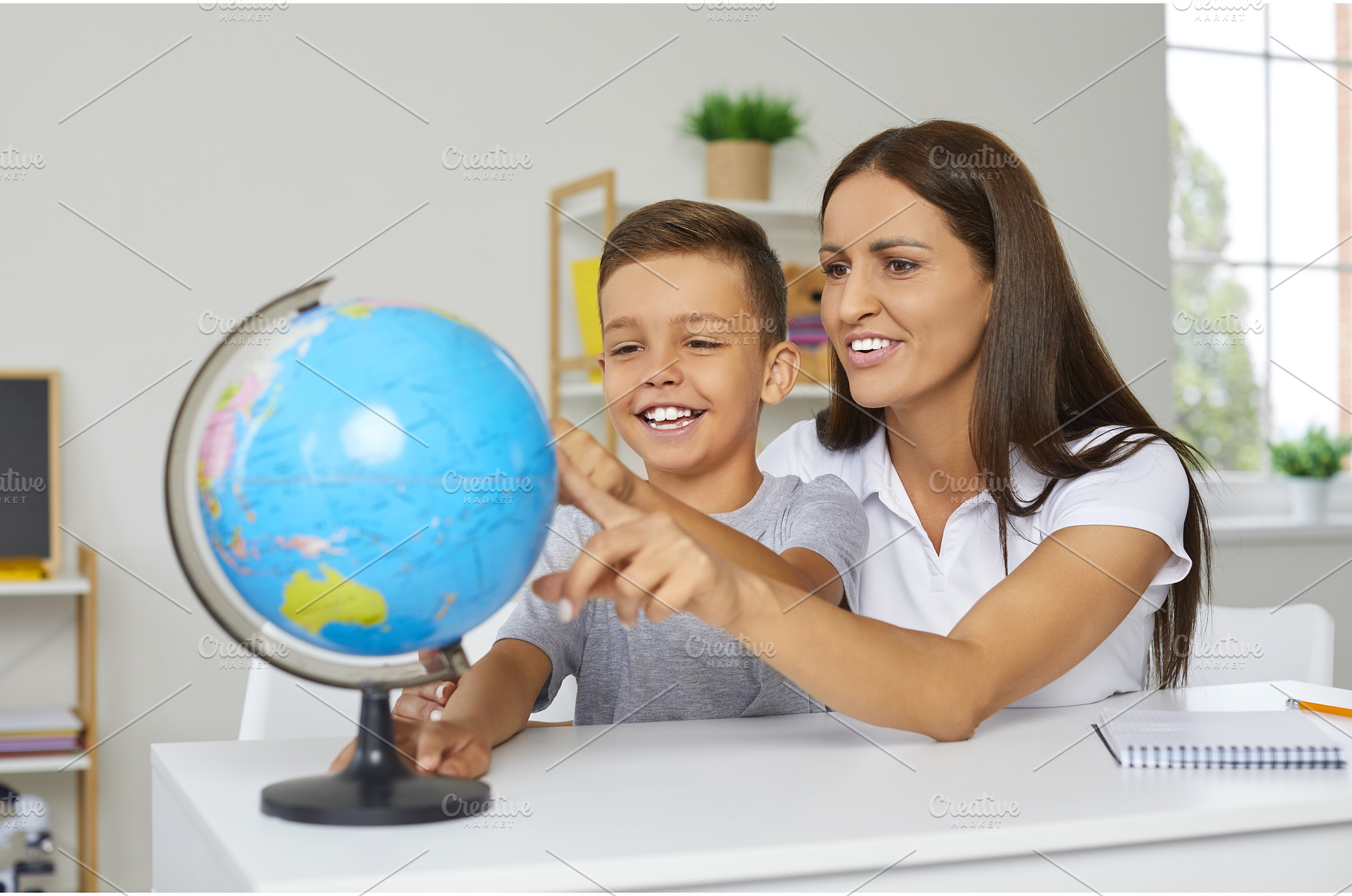 Happy mother and child learning, a Person Photo by StudioRomantic