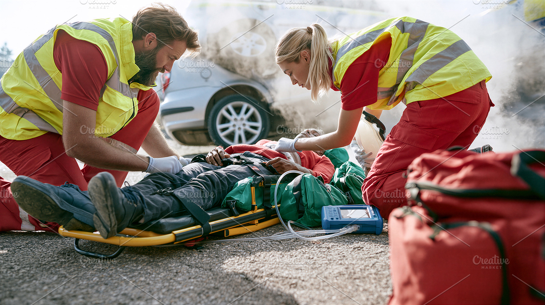 Paramedics providing emergency, a Health & Medical Photo by 7DesignLab