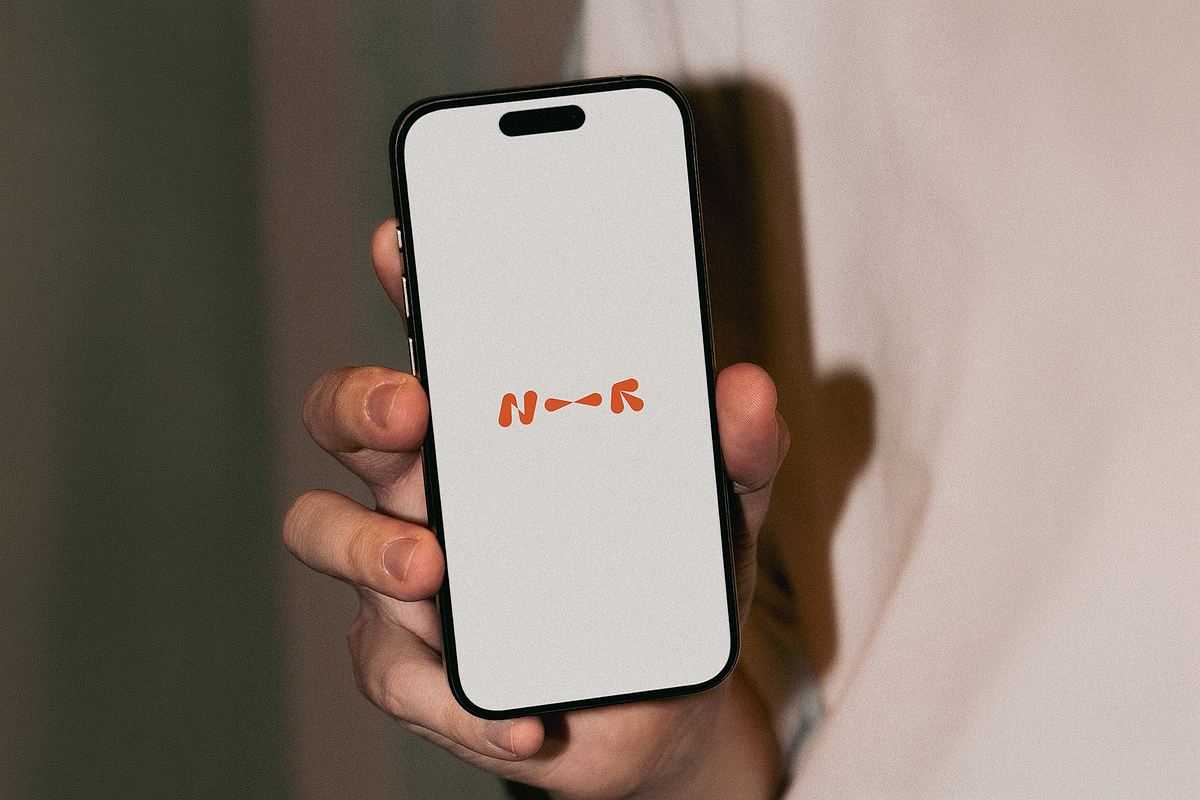 Handheld iPhone Pro Mockup LUX-13, an iPhone Mockup by New—Renew (Photo 2 of 2)