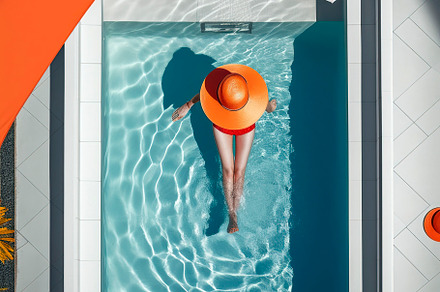 Girl in the pool from above, a Person Photo by huertas19