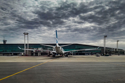 Plane parked at ramp, aeroparque airport, buenos aires, a Transportation Photo by DanFLCreativo