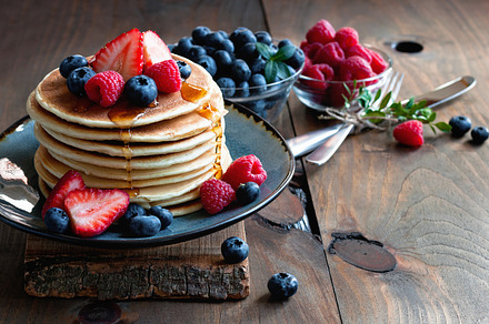 Pancakes with fresh berries featuring background, baked, and berry
