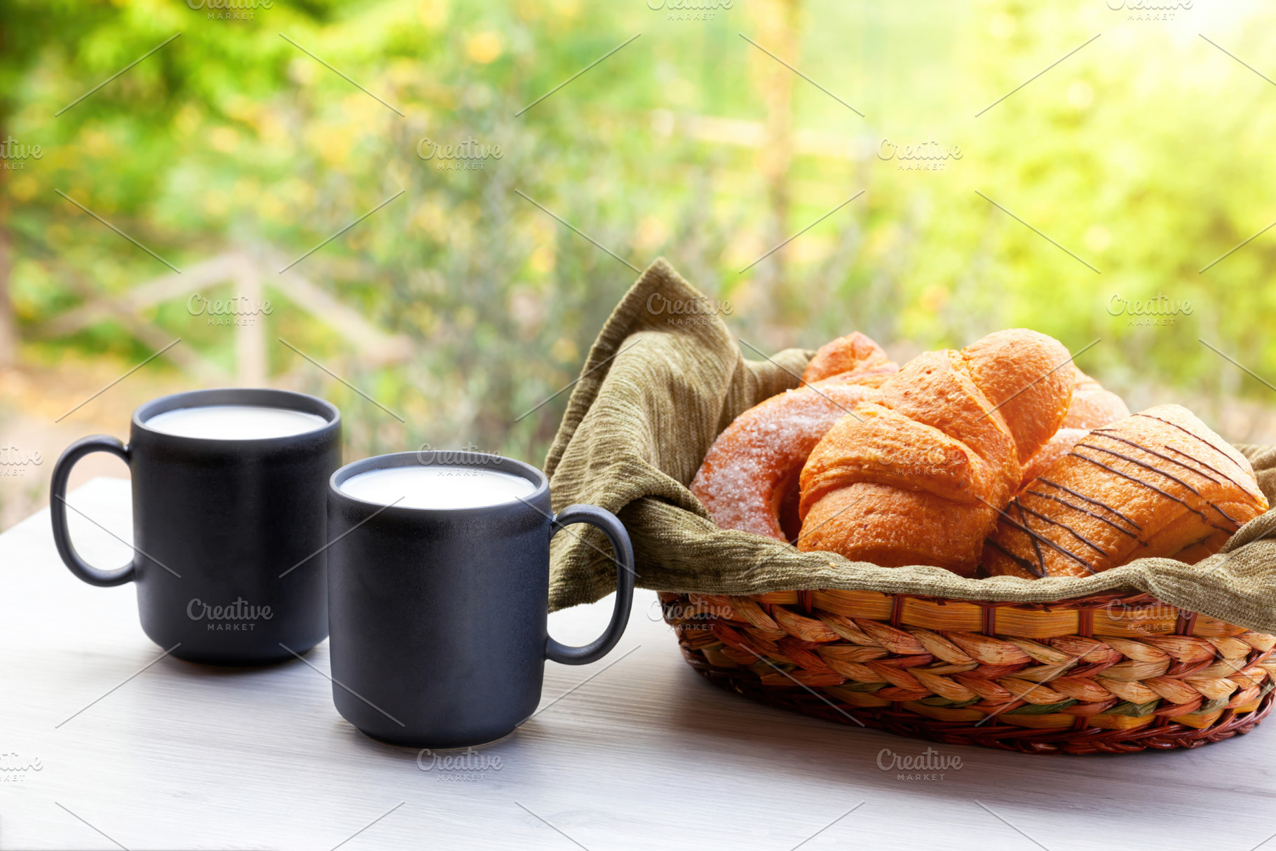 Enjoying a relaxing breakfast with milk and croissants outdoors, a Food & Drink Photo by Antonio Gravante Market