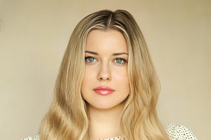 Woman portrait with blonde wavy hair, blue eyes and natural make, a Person Photo by Studio ANNA