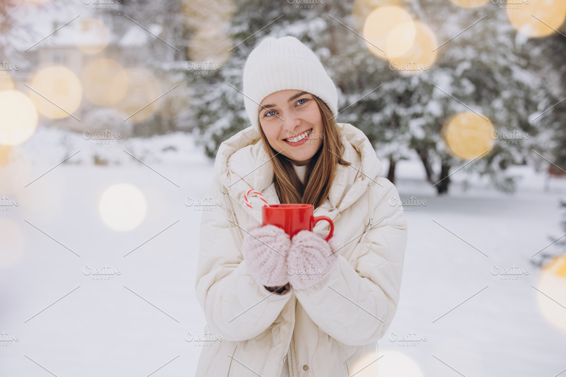 Cute happy woman holding hot coffee, a Holiday Photo by Cherkas Photography