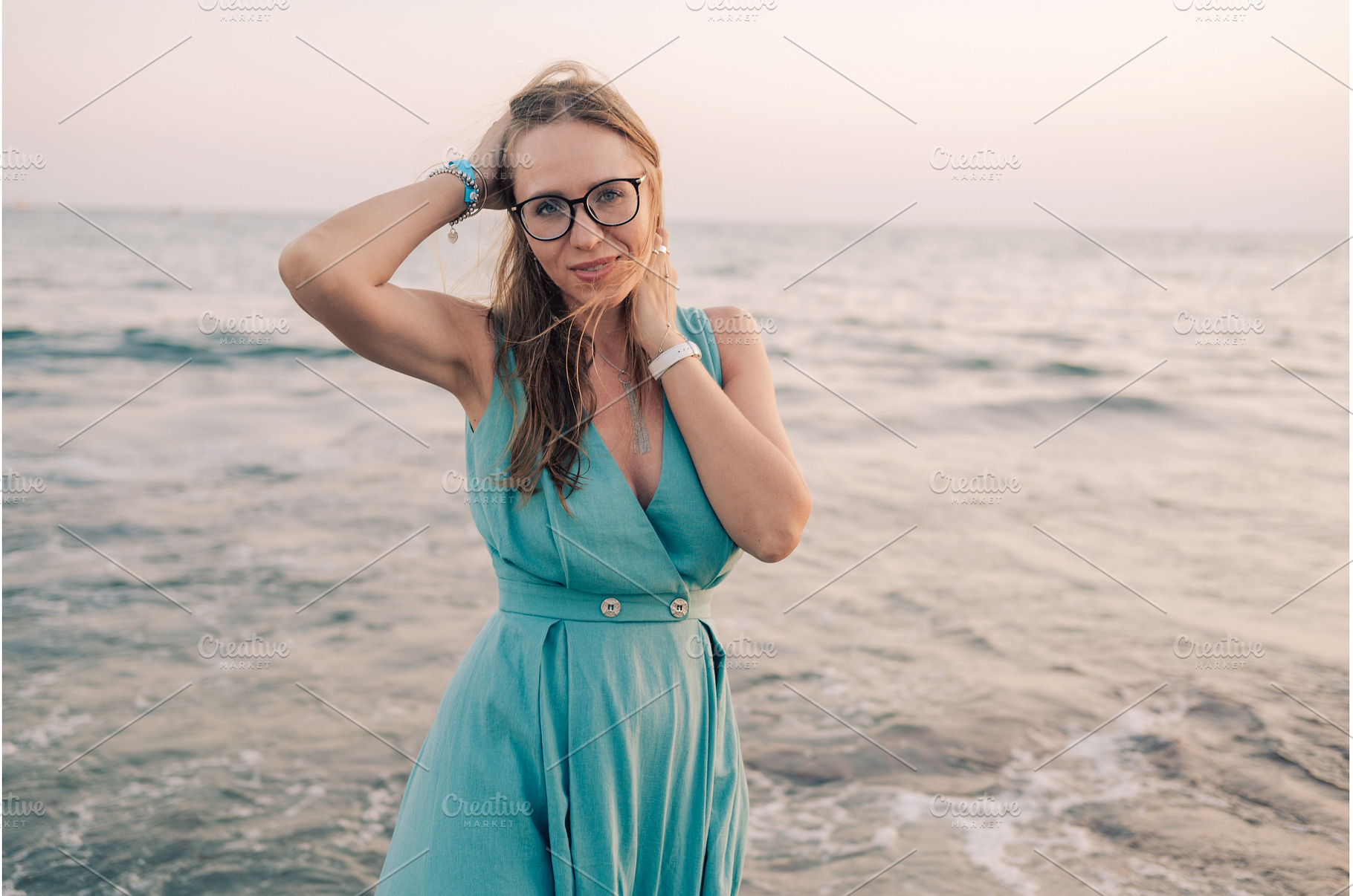 Woman in Flowing Dress on Seaside, a Person Photo by Jan Jack Russo Media