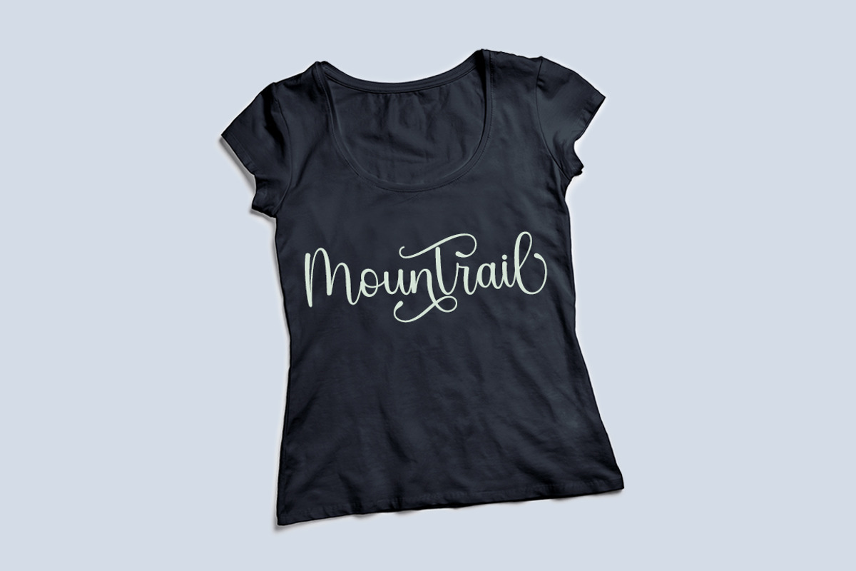 Mount Loneli, a Script Font by Strong.co (Photo 6 of 7)