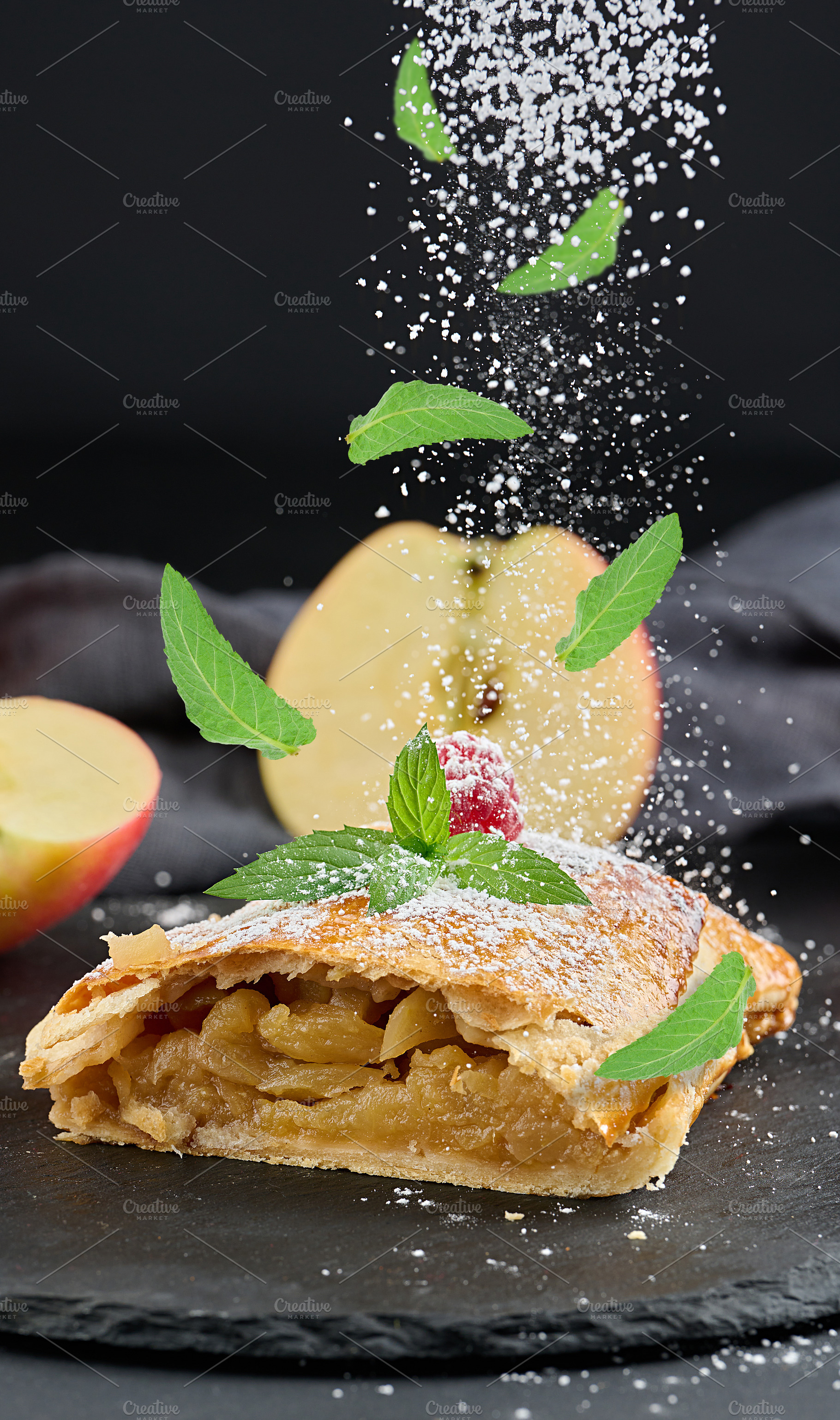 A delicious slice of apple strudel with powdered sugar sprinkled, a Food & Drink Photo by ndanko
