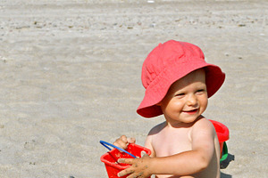 Toddler girl on the beach, a Person Photo by BOOCYS
