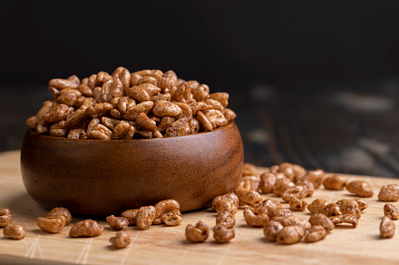 Grain wheat covered with a thin layer of chocolate, a Background Photo by MyPhotos