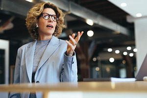 Business woman pitching an idea on a conference call