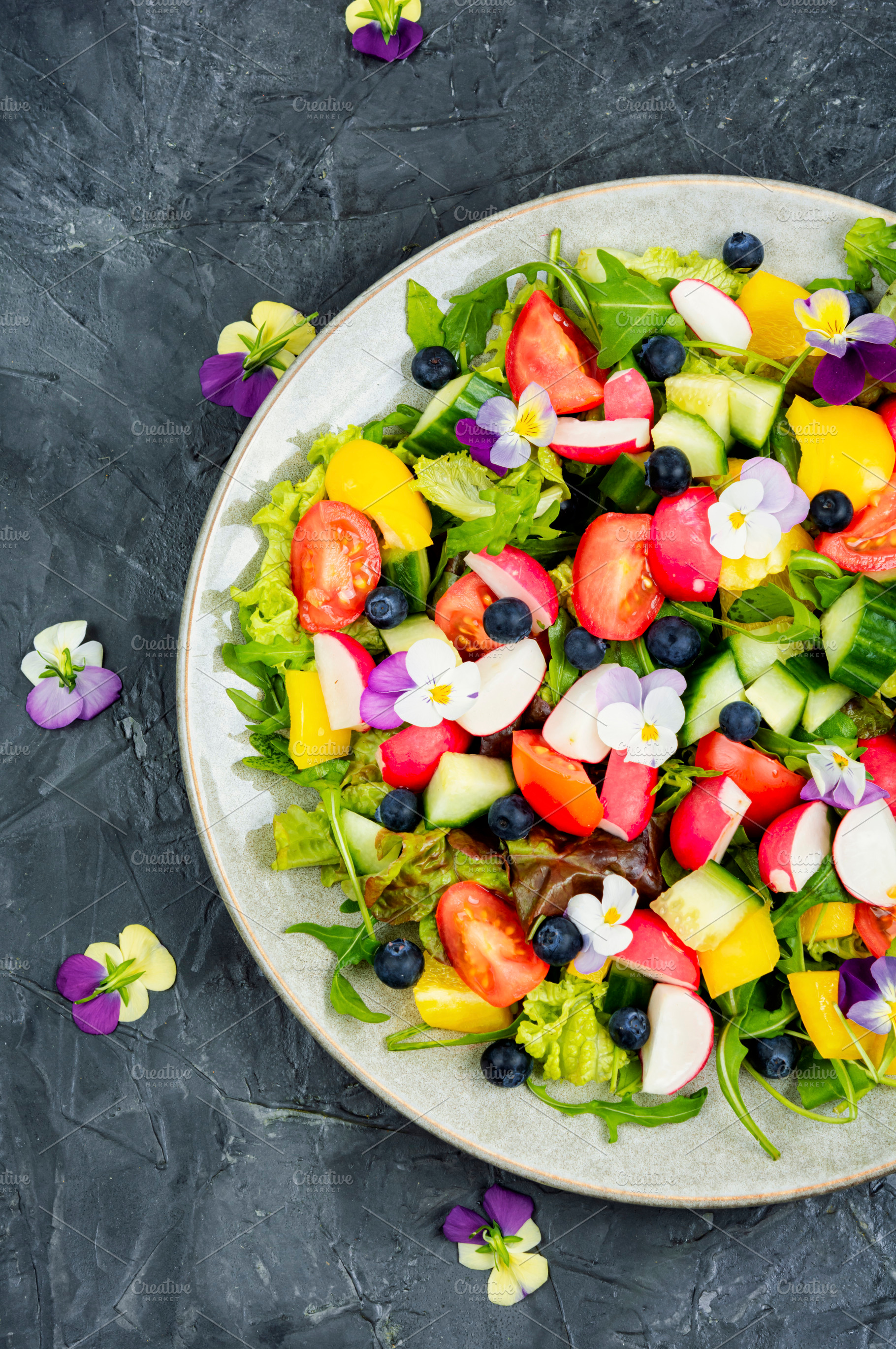 Vegetable salad decorated with flowe, a Food & Drink Photo by MLunov MLunov