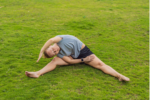 Unaltered woman exercising in a park, a Sports & Recreation Photo by Elizaveta Galitskaya