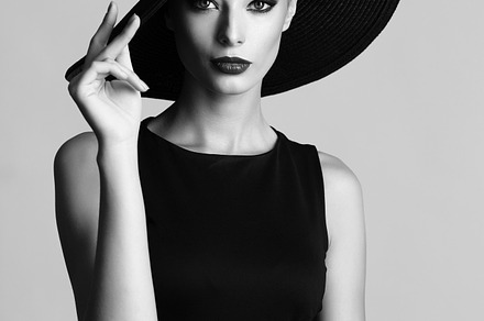 Elegant woman retro fashion containing black, white, and hat, a Beauty & Fashion Photo by MaxFrost