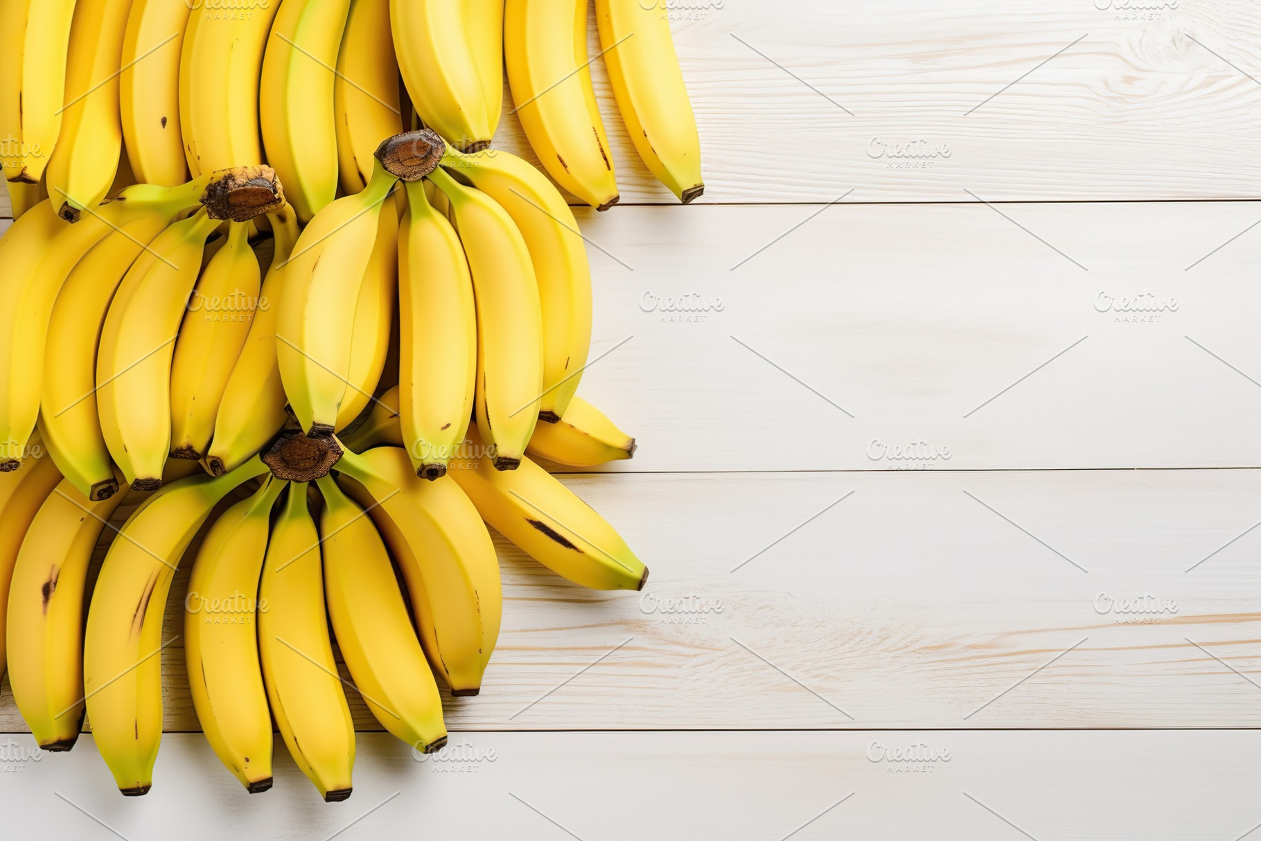 Ripe bananas on white wooden background, a Food & Drink Photo by AlyaAnd