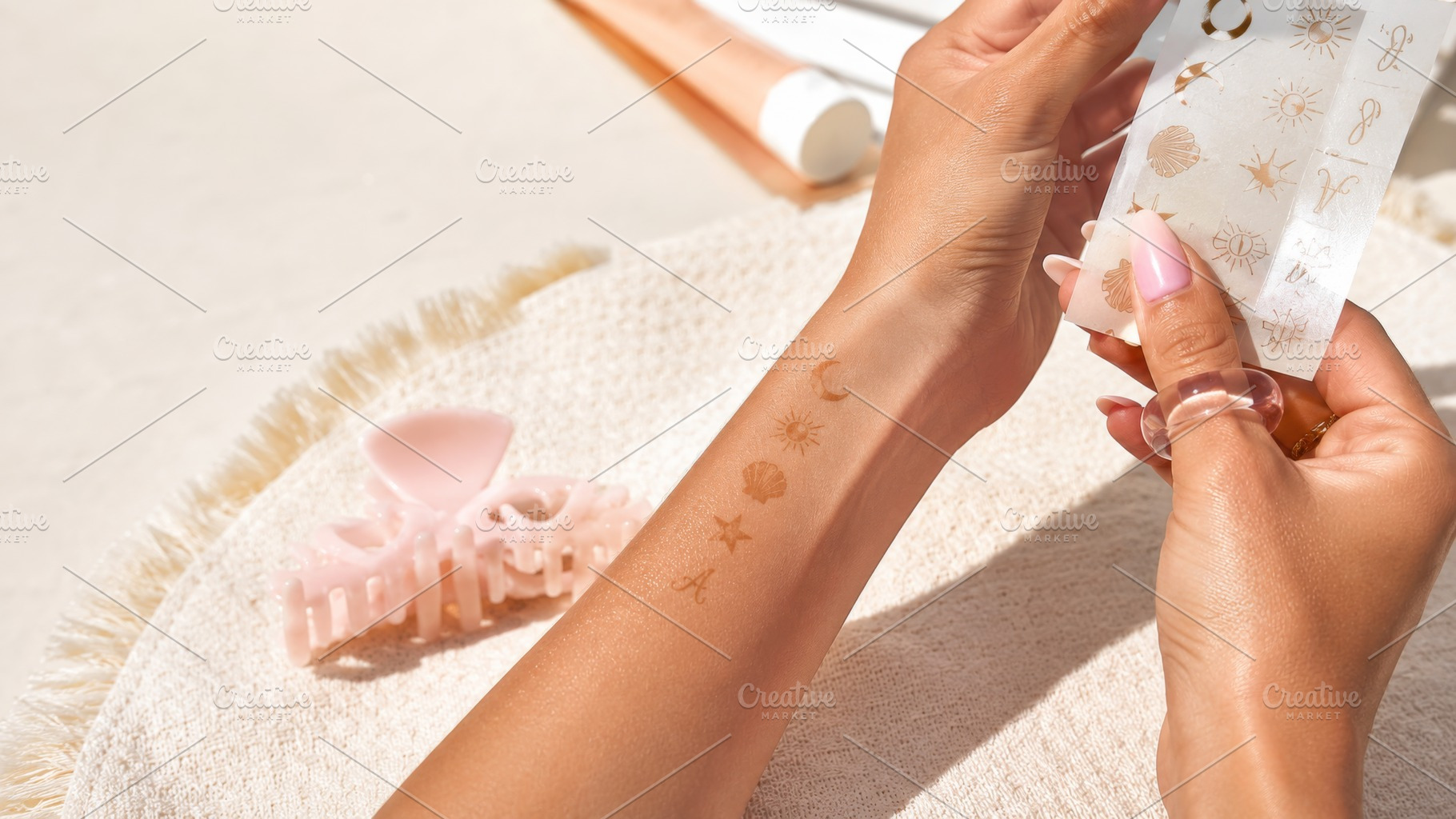 Temporary sun tan tattoos on forearm, a Photo by Dvoevnore photos