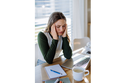 Young woman having homeoffice in her, a Business Photo by HalfPoint