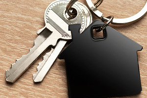 Keys with house shape keychain representing home ownership, a Business Photo by Olena Rudo