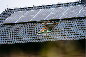 Man looking from skylight, roof, a Technology Photo by HalfPoint