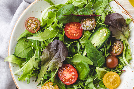 Vegetables vegetarian healthy salad with red yellow cherry tomat, a Background Photo by its_al_dente
