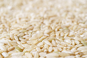 Full frame close up texture of brown rice for food and nutrition background hea, a Food & Drink Photo by Eugene_Photo