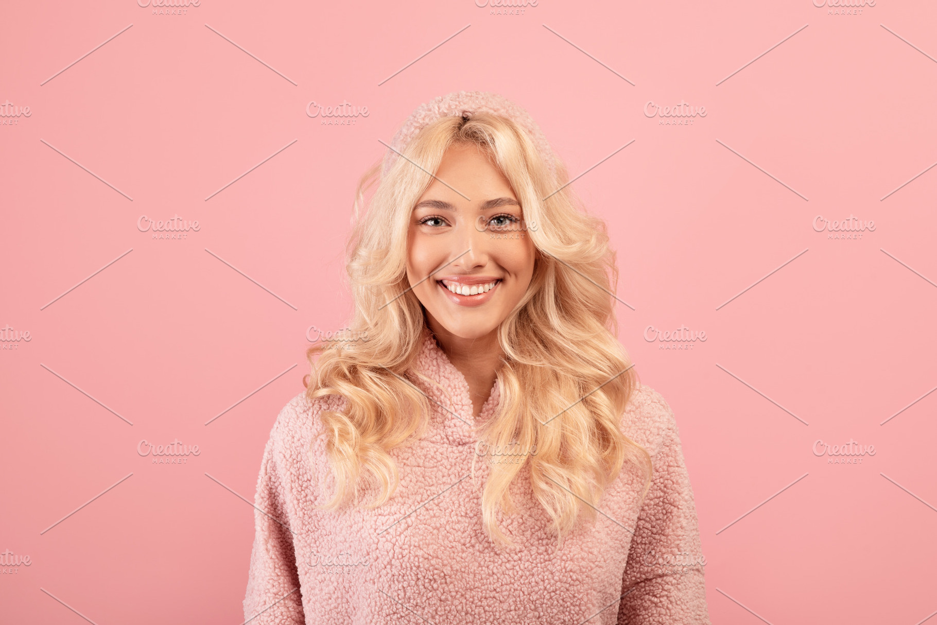 Happy person. Portrait of friendly blonde lady with beautiful smile, wearing ho, a Photo by Prostock-Studio